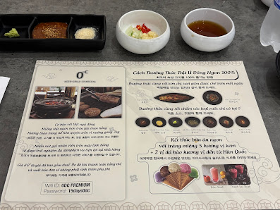 The image displays a restaurant menu from a venue in Thao Dien, Saigon. The menu features sections with text in both English and Vietnamese, including