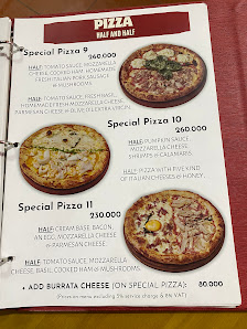 A menu page from a venue in Thao Dien, Saigon, showcasing three 'Special Pizza' options (Pizza 9, 10, 11) with corresponding images, descriptions, and