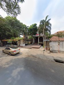 The image shows an exterior view of a residential area in Thao Dien, Saigon with houses and trees visible.