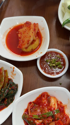 A selection of Korean side dishes and a kimchi dish