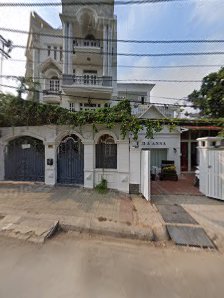 The image shows an exterior view of a large residential building in Thao Dien, Saigon.