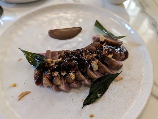 Grilled Meat with Nut Topping