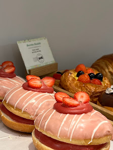 Pink Frosted Pastries with Fruit Topping