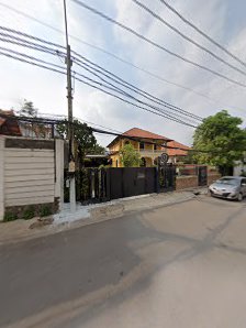 The image shows a street view of an area in Thao Dien, Saigon with residential houses and greenery visible on the right side.