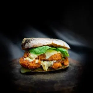 Doppel Schnitzel Sandwich at Bread&Butter HCM - Sourdough Bread & Deli Sandwiches