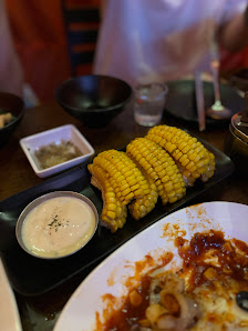 Corn on the cob with dipping sauce