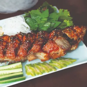 Roasted Snakehead Fish with Tamarind Sauce at Chảo Cá Vincom Thảo Điền