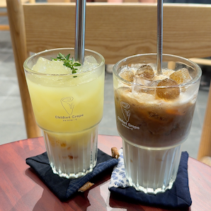 Two glasses of beverages on a table at Thao Dien, Saigon.
