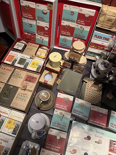 A variety of tea products displayed on a table in what appears to be an interior setting at Thao Dien, Saigon.
