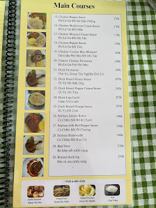 A menu from a restaurant named Thao Dien in Saigon displaying various dishes and their descriptions along with images of the food items.