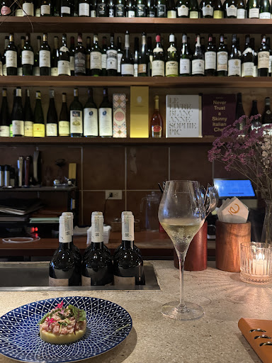 Etēsia • kitchen counter + wines photo 5 in Ha Noi
