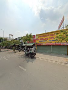 The image shows a street view of an establishment in Thao Dien, Saigon with signage indicating it is likely related to food or beverages.