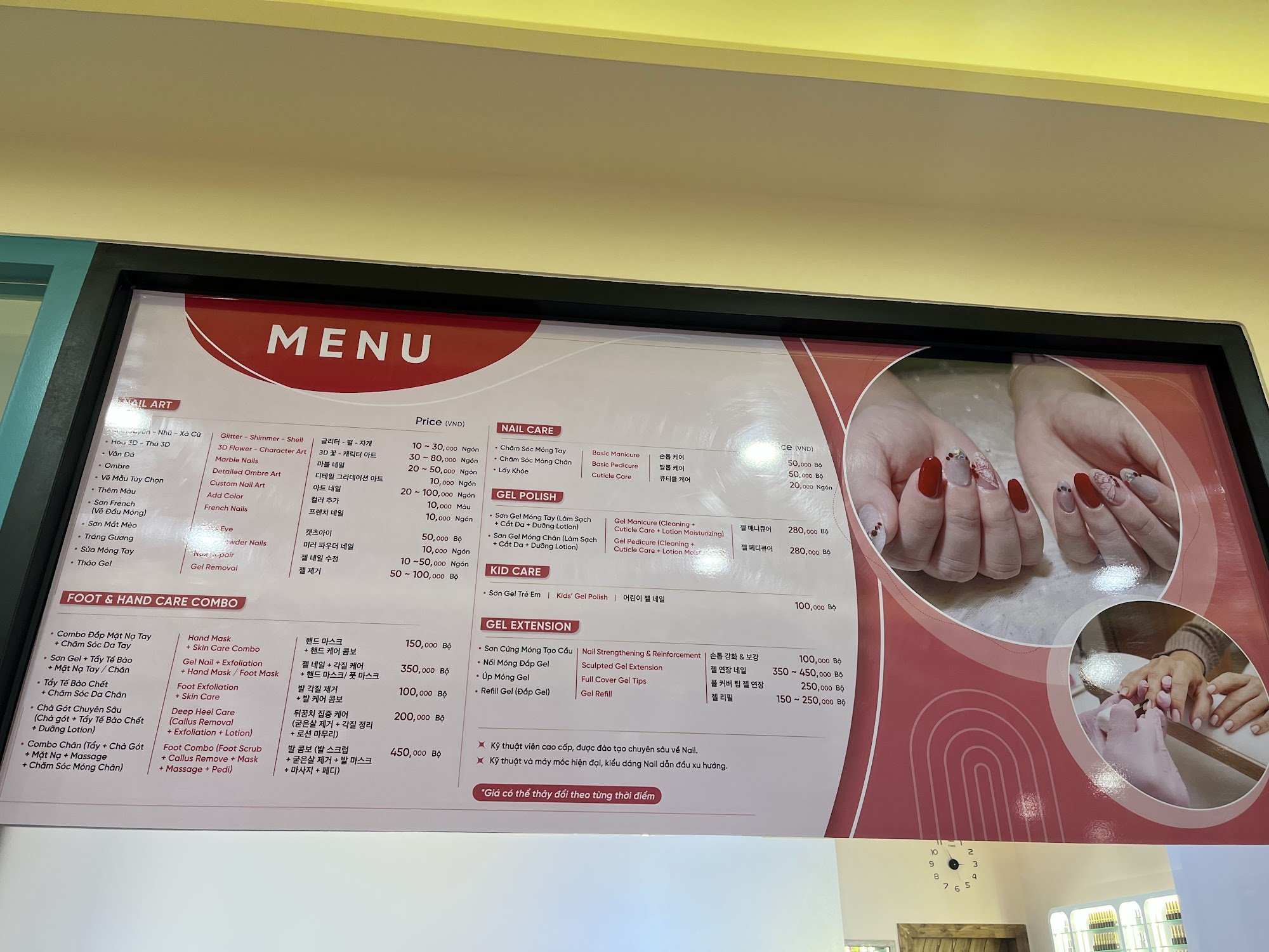 A menu board displaying various nail art and care services offered at a salon in Thao Dien, Saigon.