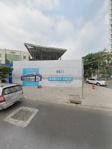 The image shows an exterior view of a building under construction or renovation in Thao Dien, Saigon. A large billboard with the text 'GS36' and addit