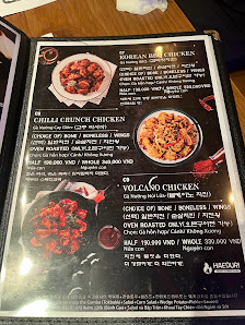 A menu from a restaurant in Thao Dien, Saigon featuring Korean BBQ and Volcano Chicken dishes.