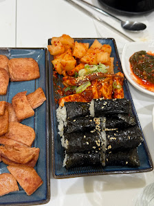 A variety of Korean dishes including kimchi and tofu