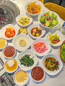 A selection of Korean side dishes and main courses