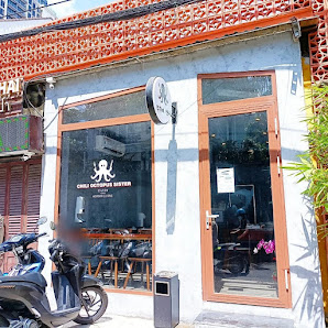The image shows an exterior view of a restaurant named 'Crazy Octopus Restaurant' located in Thao Dien, Saigon.