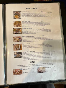 A menu from a restaurant in Thao Dien, Saigon is displayed on what appears to be a binder or folder. The pages contain various food items with their d