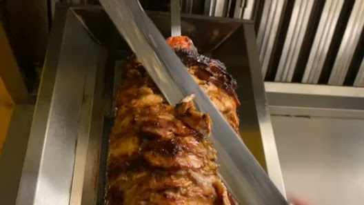 Grilled Meat on Vertical Rotisserie