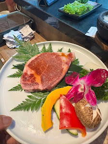 Raw Steak Platter with Orchid Garnish