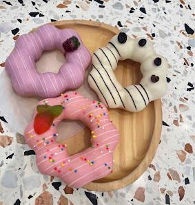 Three decorated donuts