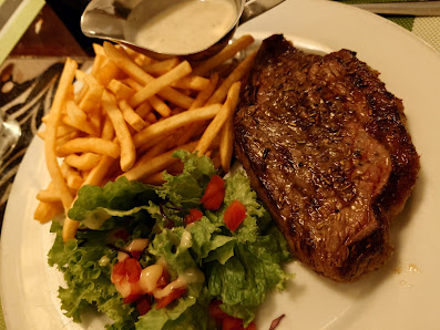 Grilled Steak with French Fries and Salad