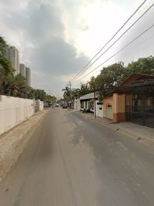 The image shows a street view in Thao Dien, Saigon during the daytime with overcast skies.