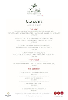A printed menu for La Villa, a venue in Thao Dien, Saigon, featuring sections for THE MEAT, THE CHEESE, and THE DESSERT with various dishes listed in 