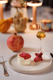 Raspberry Topped Dessert with Macaron