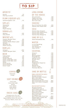 A menu from a venue in Thao Dien, Saigon featuring various alcoholic beverages such as spirits, liqueurs, beers, and cocktails.