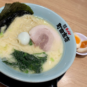 Japanese-style soup (likely ramen or miso soup variant)