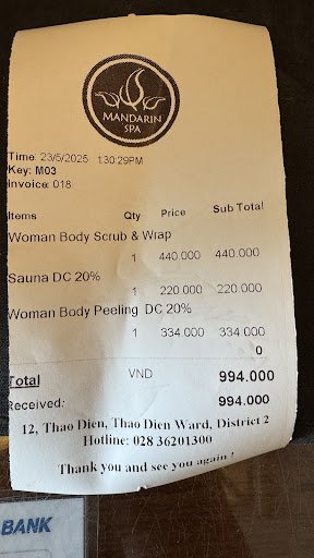A receipt from Mandarin Spa dated March 23rd, 2025 at 1:30 PM for various spa treatments and products.