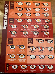 A printed menu from a restaurant in Thao Dien, Saigon, featuring sections like 'HORS D'OEUVRE', 'MAIN', and 'DESSERT'. Each section lists dishes with 