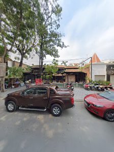 The image shows a parking area outside of what appears to be an establishment in Thao Dien, Saigon.
