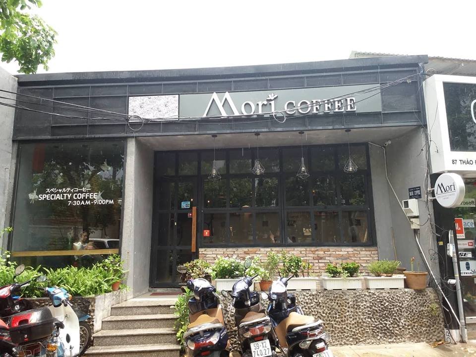 The image shows an exterior view of a coffee shop named 'Mori Coffee' located at Thao Dien in Saigon.