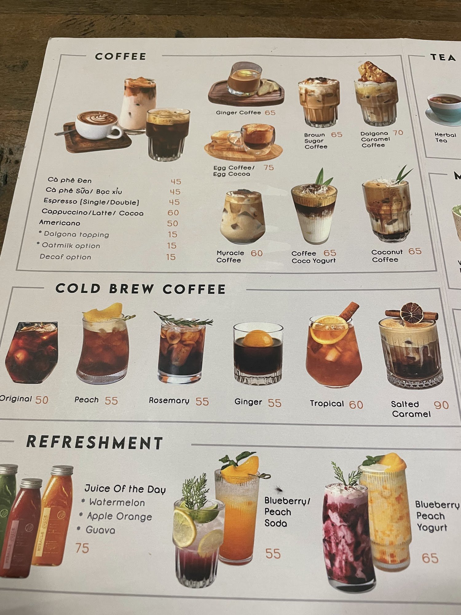 A beverage menu from a venue in Thao Dien, Saigon, featuring sections for COFFEE, TEA, COLD BREW COFFEE, and REFRESHMENT. The COFFEE section includes
