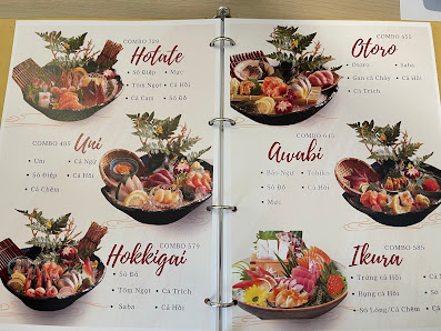 A menu from a restaurant in Thao Dien, Saigon displaying various dishes such as Hotate, Otoro, Uni, Awabi, Hokkigai, Ikura and more.