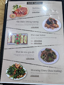 A menu from a restaurant in Thao Dien, Saigon, featuring Vietnamese dishes with images of each item. The menu includes items like 'Gà chiên không xươn