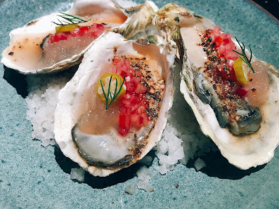 Oyster with garnish