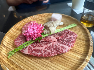 Raw Beef Platter with Asparagus and Edible Flower
