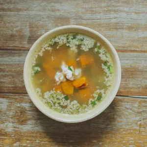 Pumpkin soup with fresh shrimp