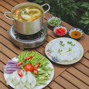 Sour Bamboo Shoot Fish Hotpot with Catfish at Quán Bụi Bistro