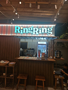 The image shows an exterior view of a food establishment named 'Ring Ring' in Thao Dien, Saigon.