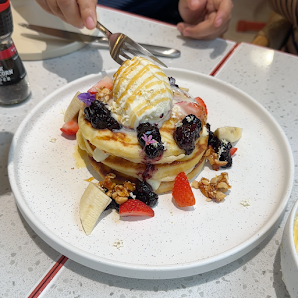 Pancakes with Whipped Cream and Berries