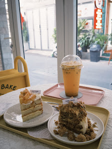 The image shows a table setting in an indoor cafe or restaurant environment at Thao Dien, Saigon.