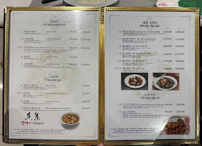 The image shows a menu from Thao Dien, Saigon featuring various dishes and their prices in Vietnamese Dong.