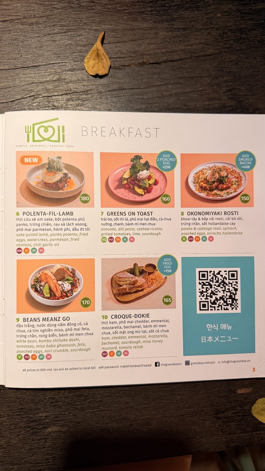 The image displays a breakfast menu page from a restaurant in Thao Dien, Saigon. It features six breakfast items (numbered 6-10) with photographs, pri