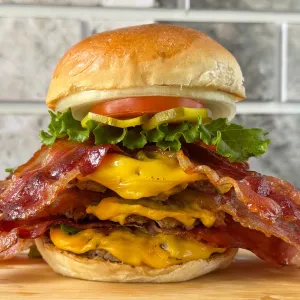 TRIPLE BACON CHEESEBURGER (Beef Burger with Smoked Bacon and Three Layers of Beef) at Soul Burger