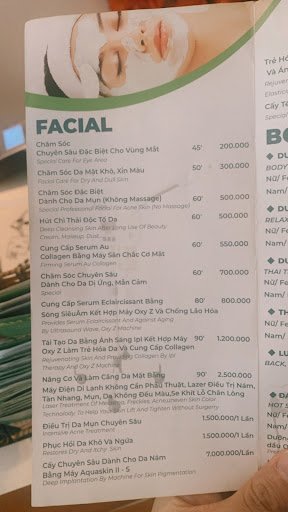 A menu from a Vietnamese restaurant featuring various facial treatments and their prices.
